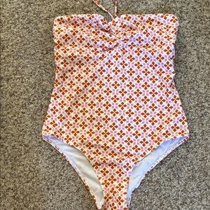 Pink Lily Kids One-Piece Swimsuit in Orange and White was altered on side
